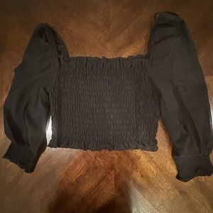 Fits a little large in the shoulders